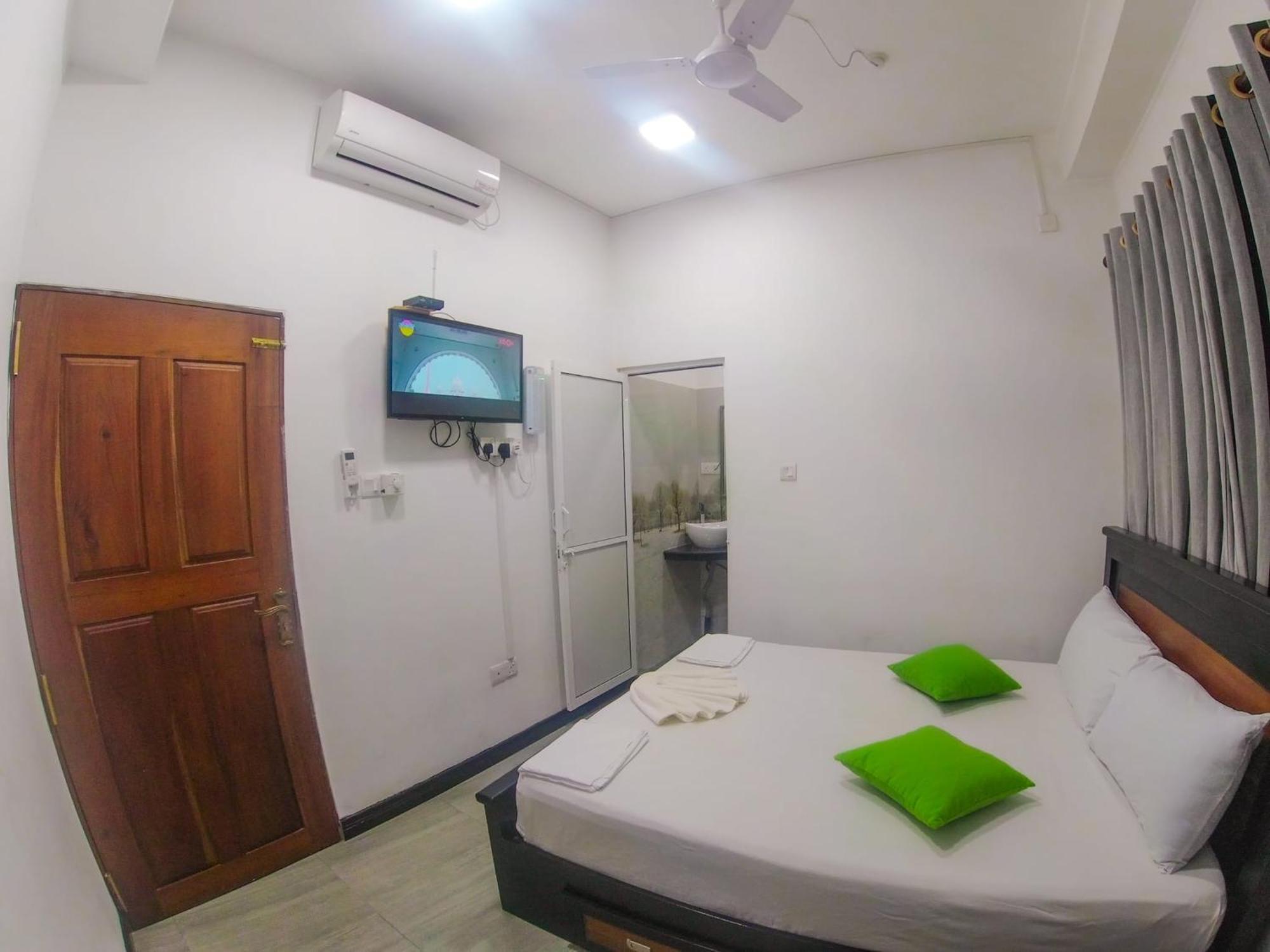 Sea Breeze Guest House Negombo Kamer foto
